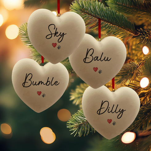 A Personalised Paw Print & Heart Ceramic Heart Bauble